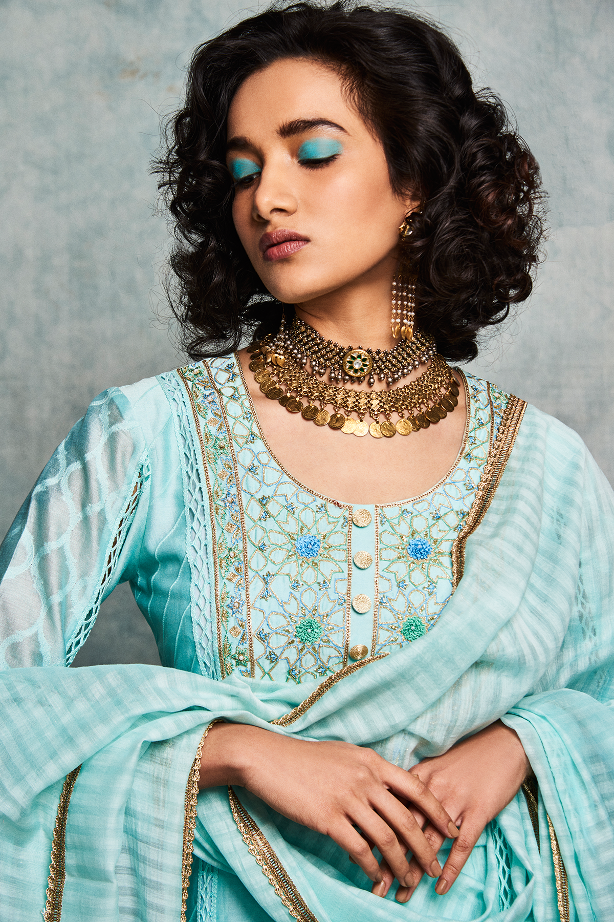 Ice blue gharara with short kurta and a dupatta closeview