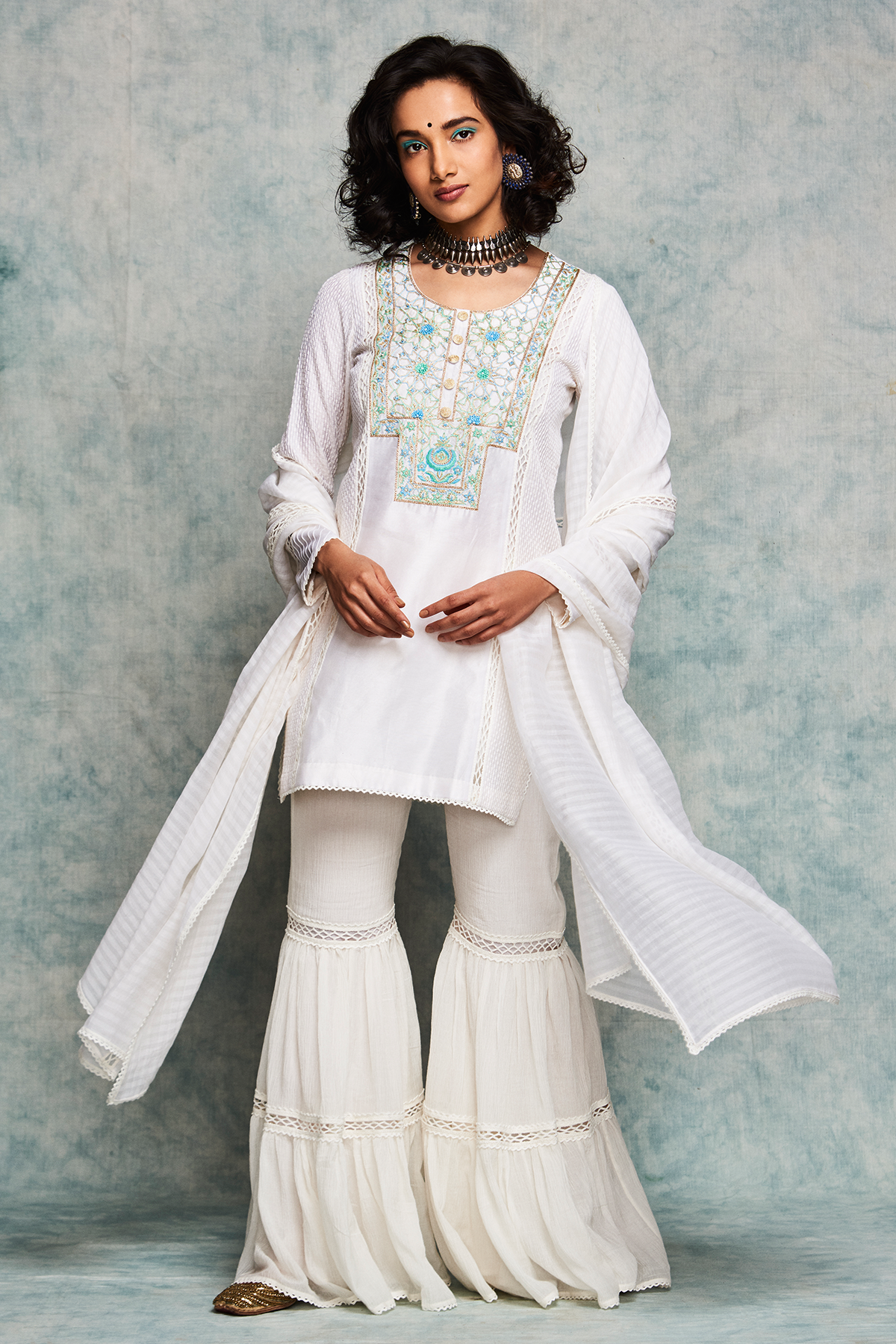 White gharara pants with short kurta and dupatta