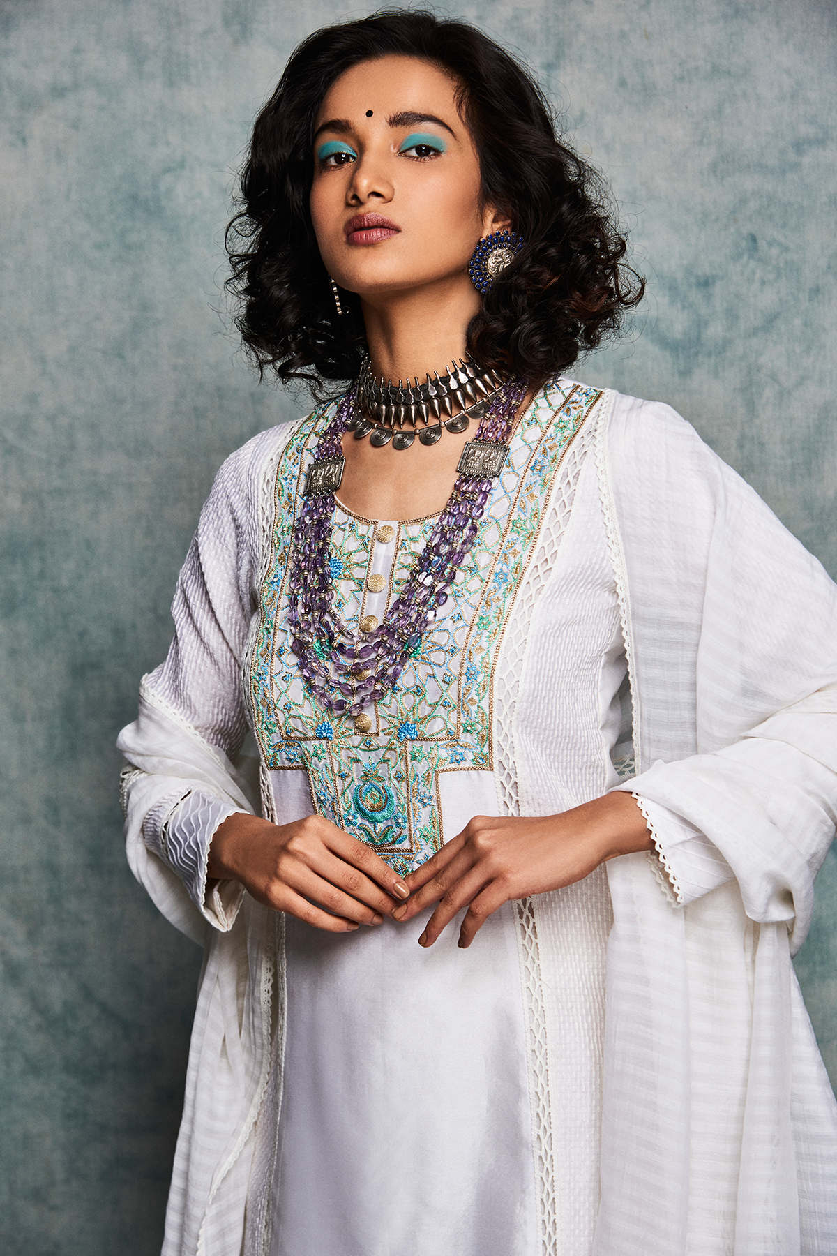 White gharara pants with short kurta and dupatta