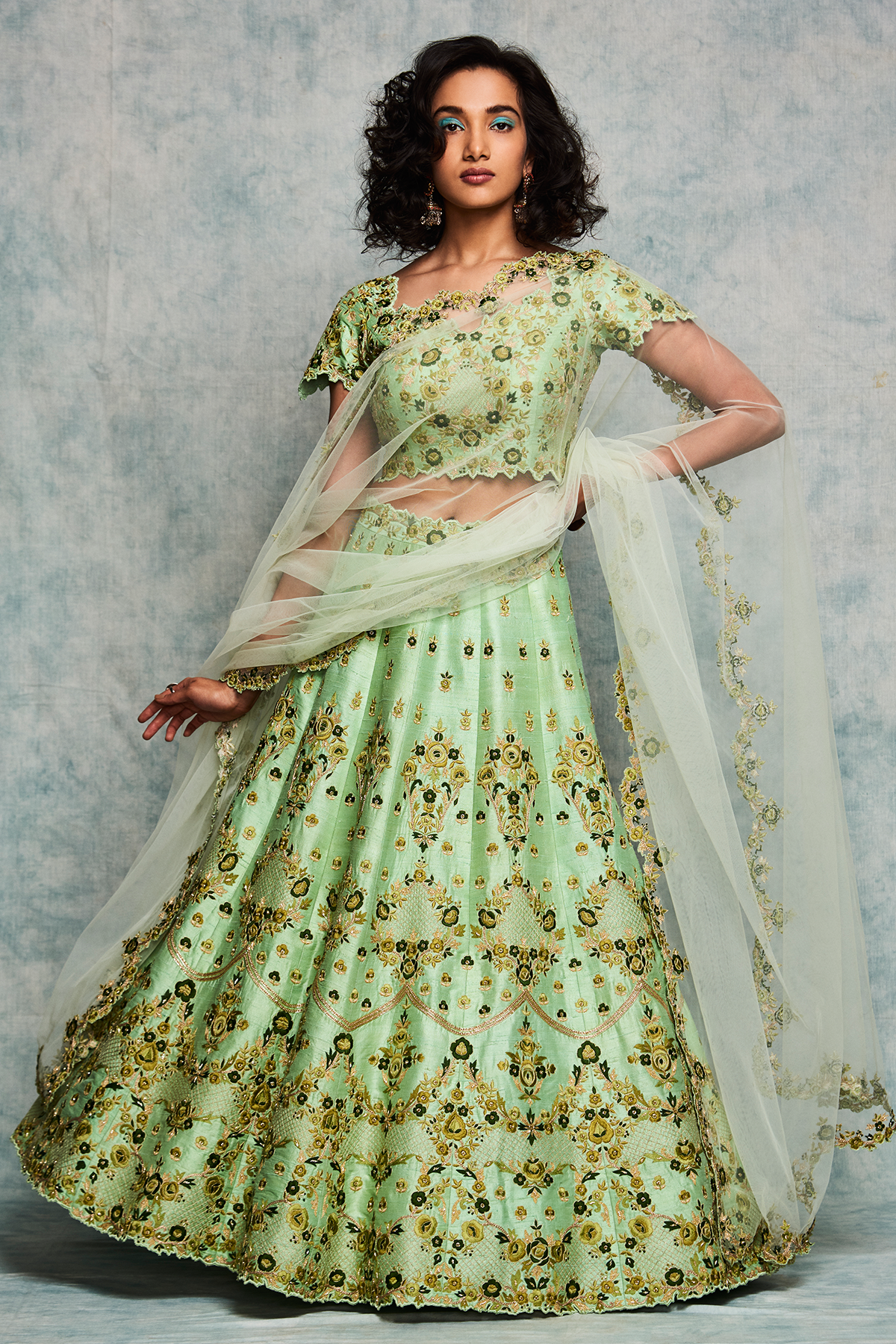 Green raw silk lehenga set with tulle dupatta