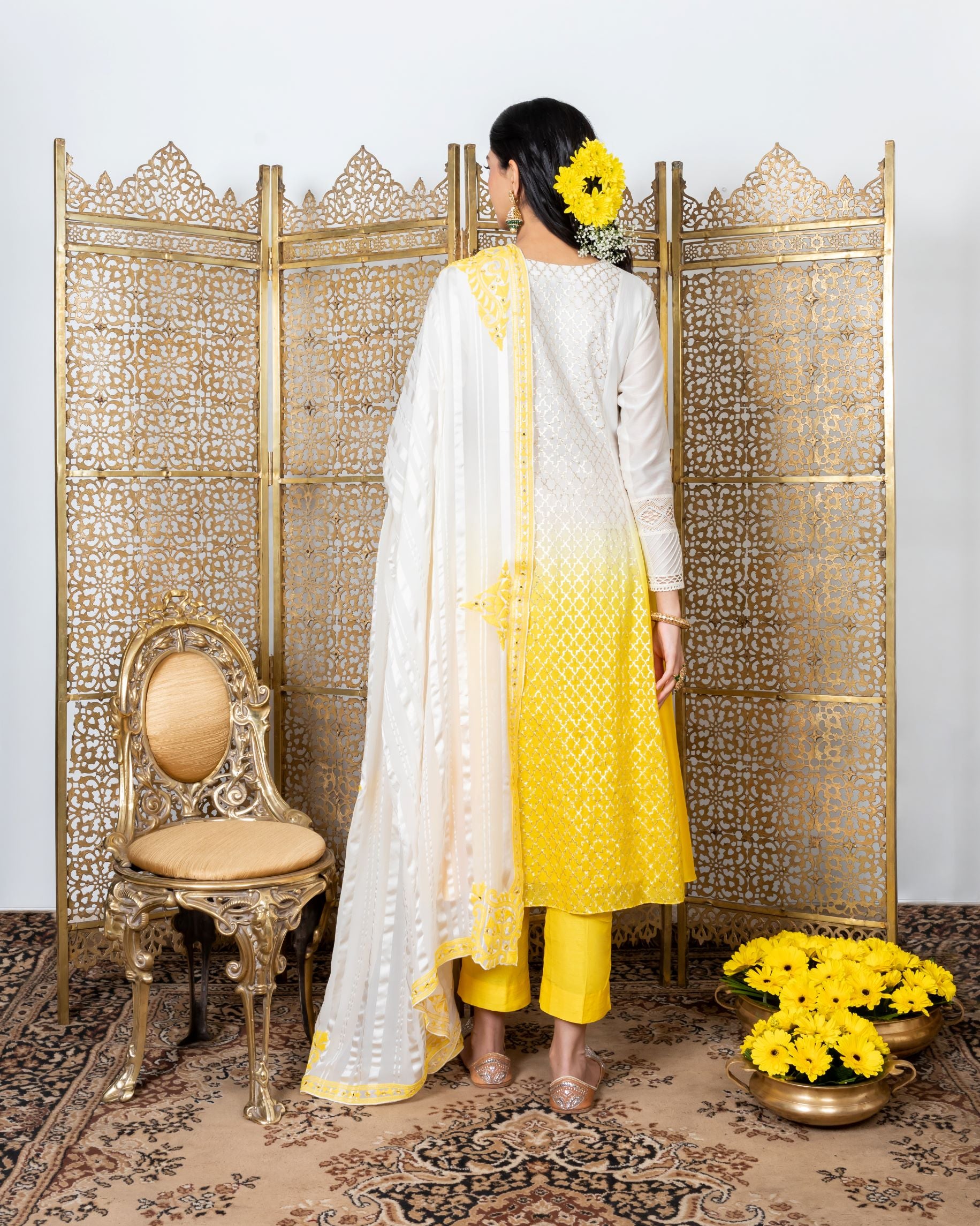 Yellow-white kurta with yellow straight pants backview