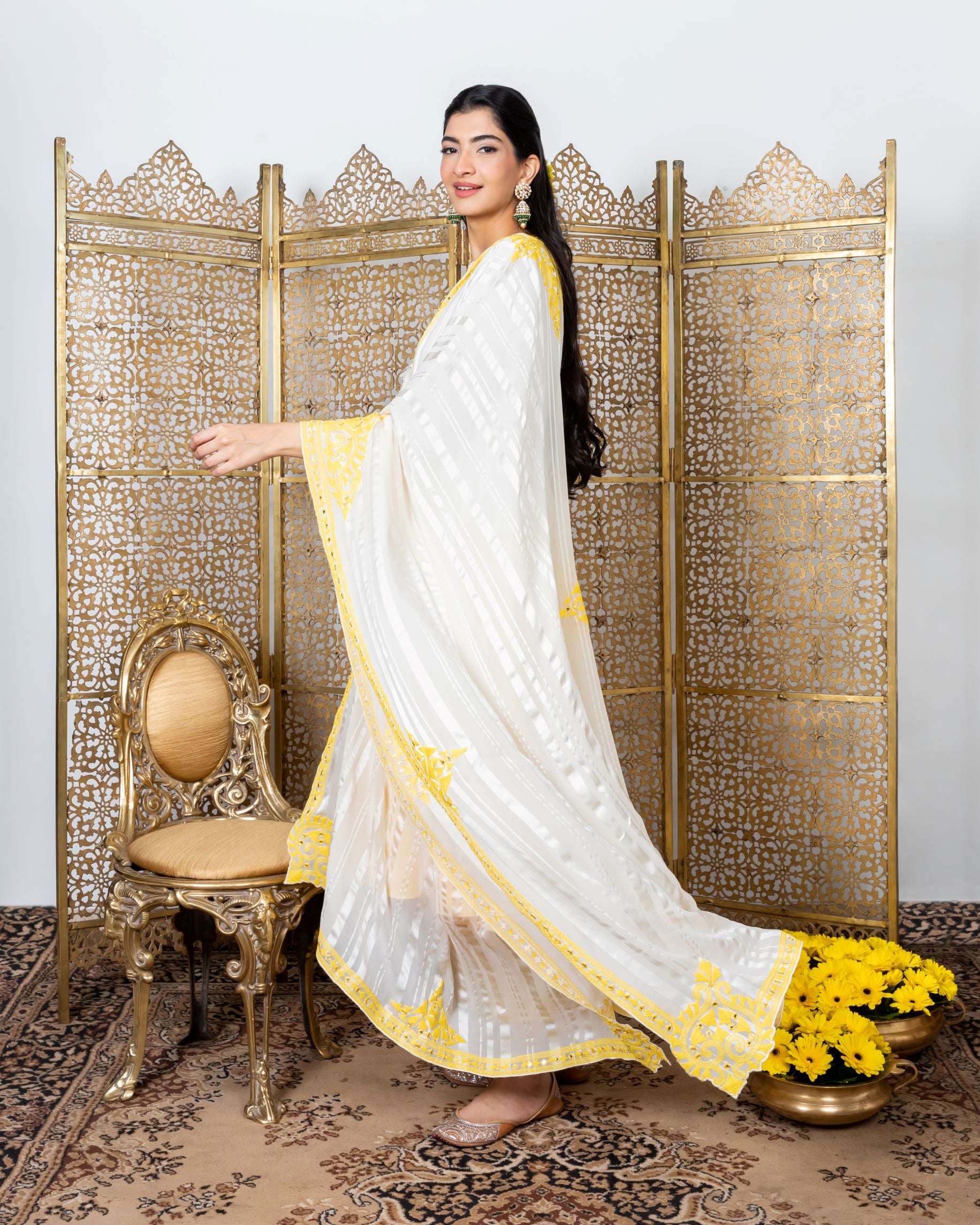 Yellow-white kurta with yellow straight pants sideview