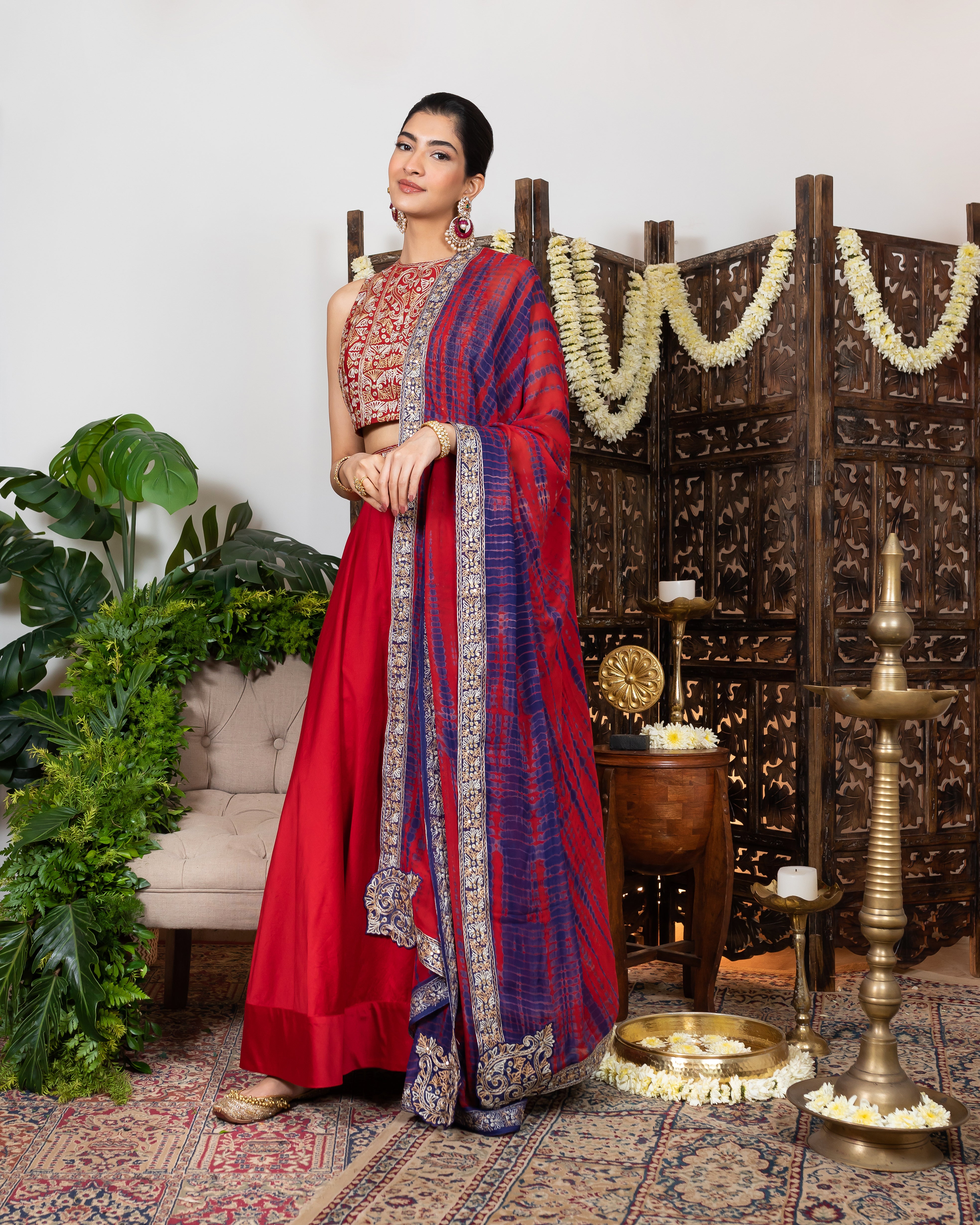 Red Lehenga in chanderi with embroidered waistline.