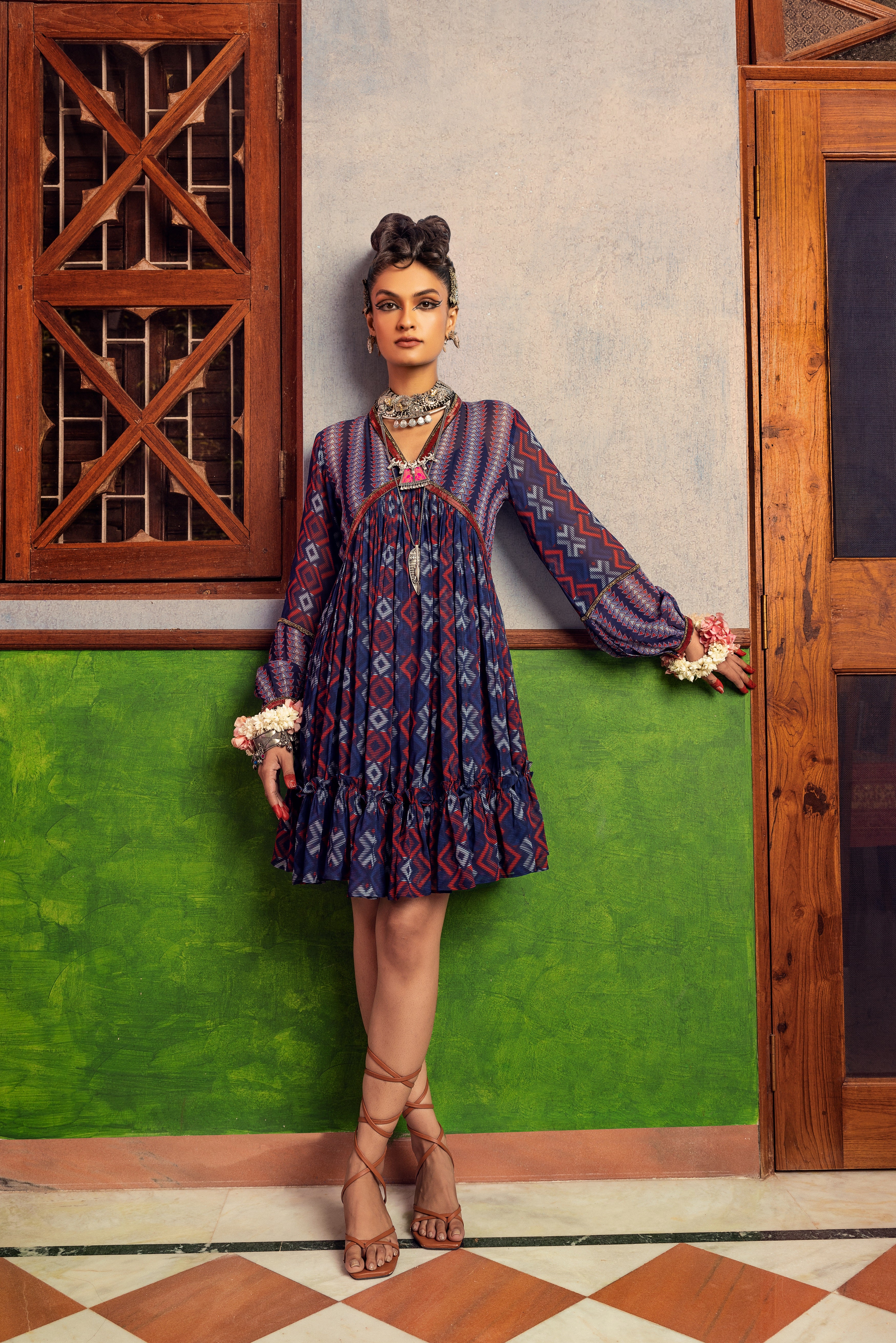 Blue printed dress in georgette fabric with embroidery.