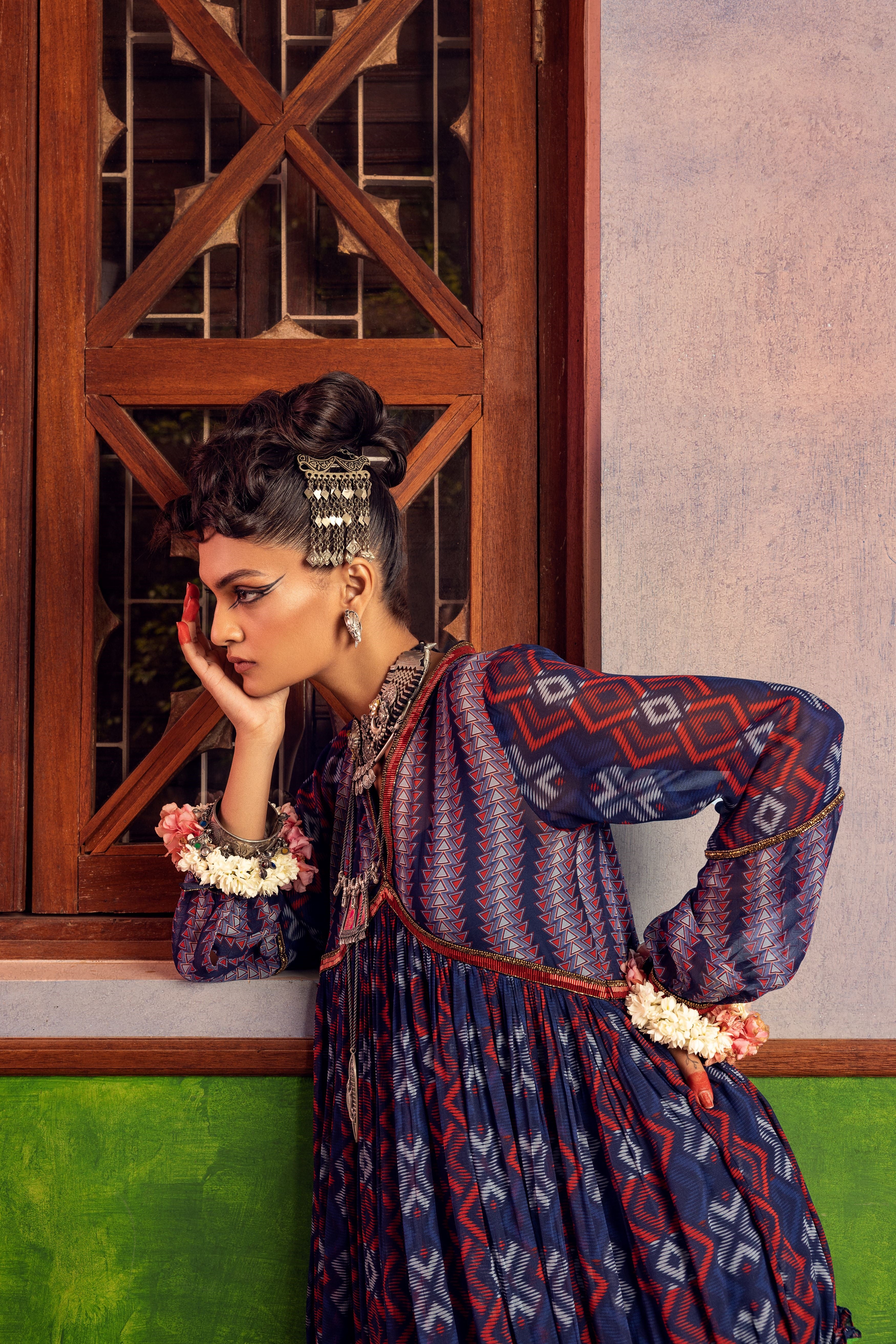 Blue printed dress in georgette fabric with embroidery.