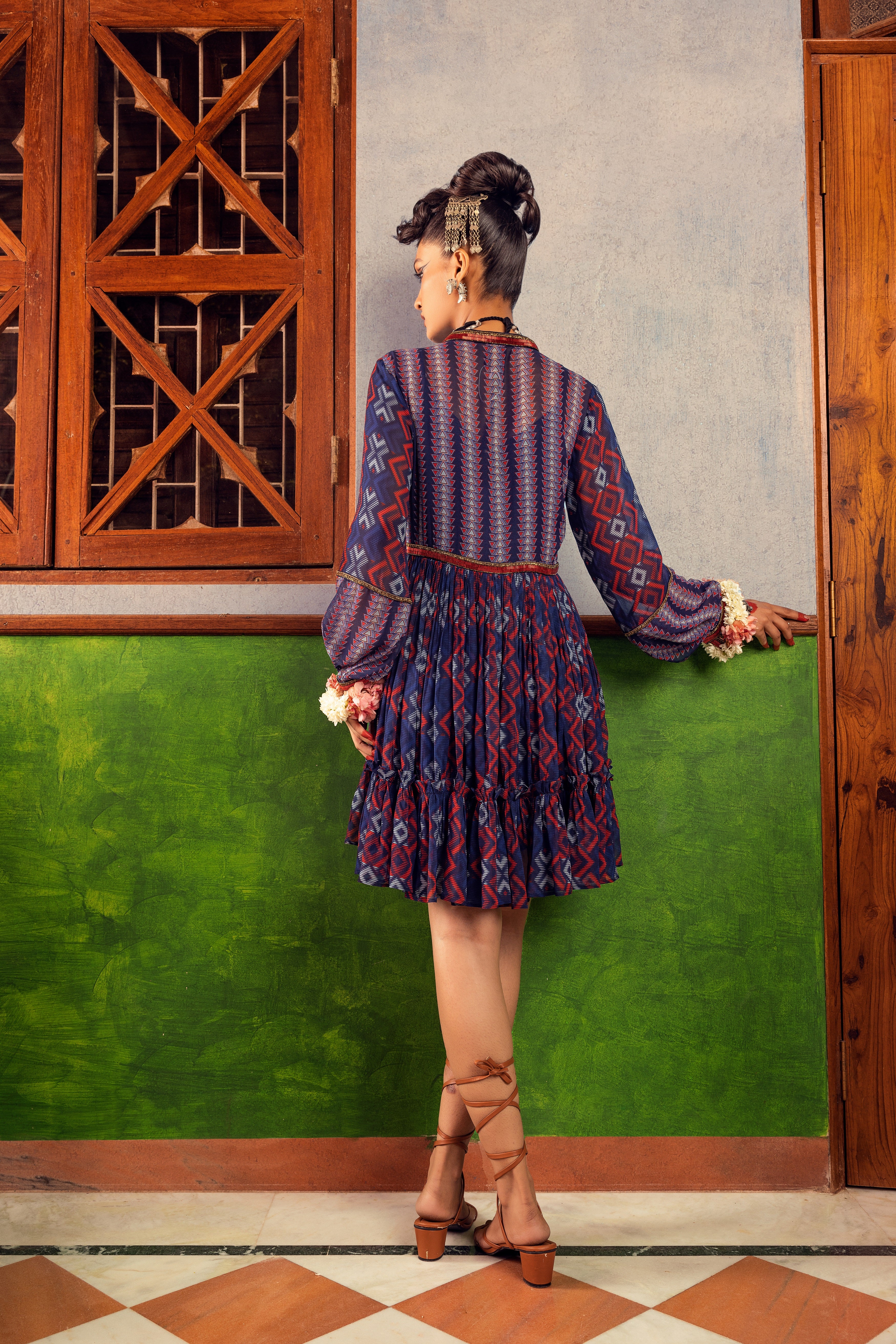 Blue printed dress in georgette fabric with embroidery Backview