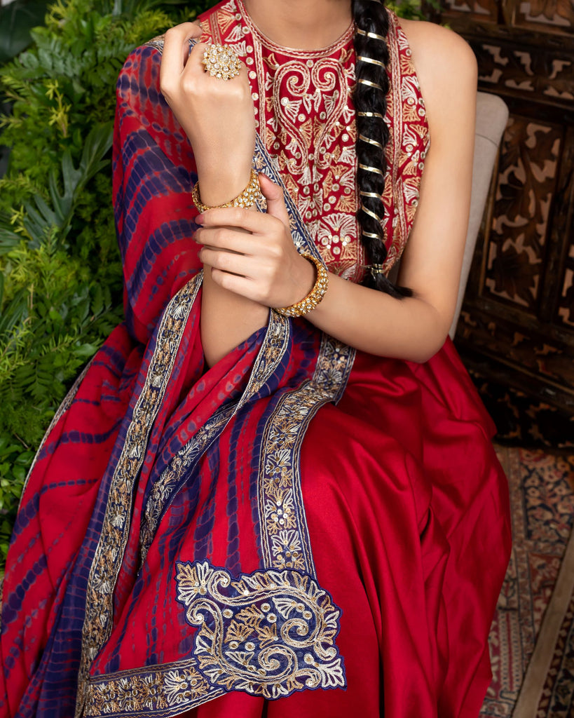 Red Lehenga in chanderi with embroidered waistline.  closeview