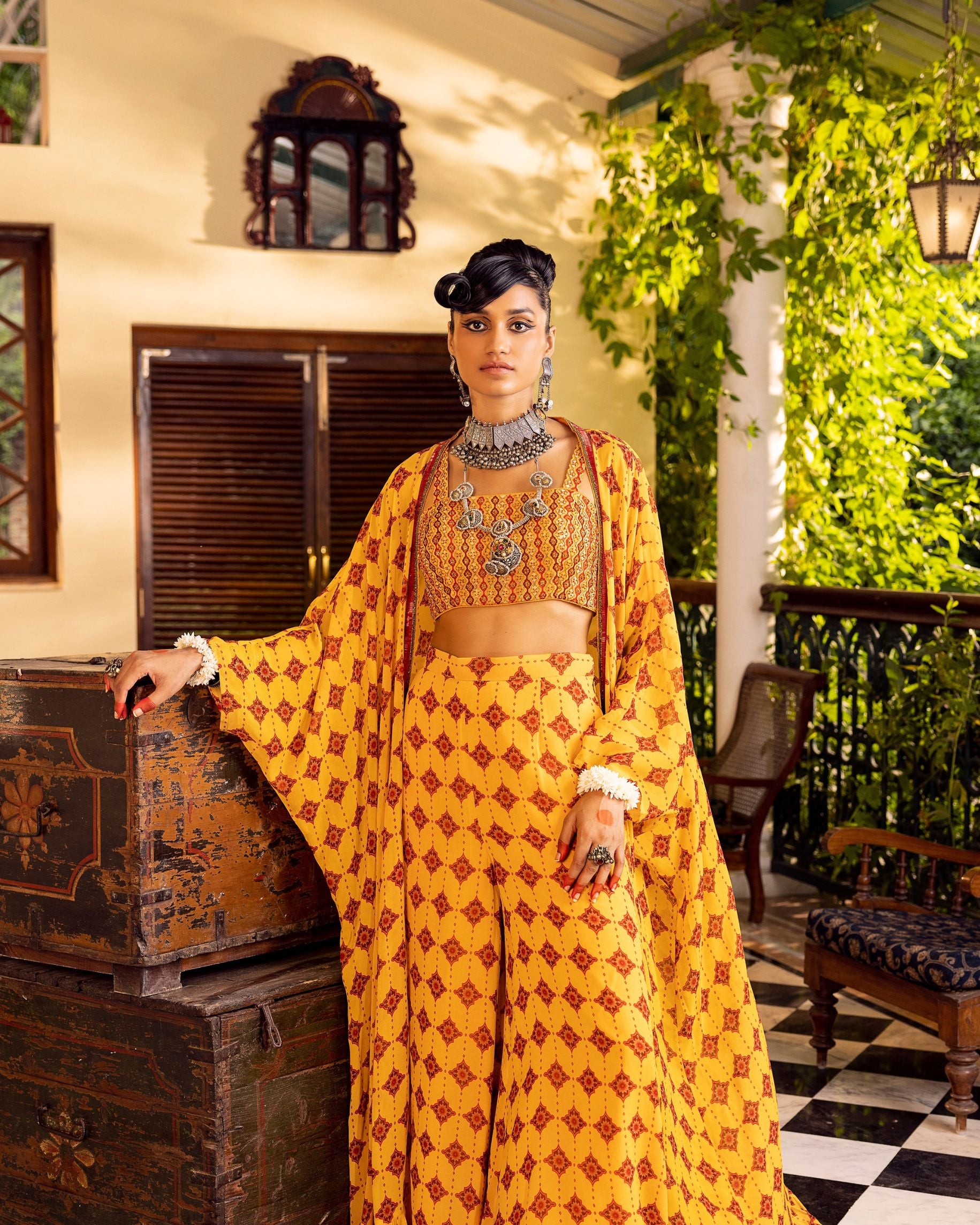 Yellow bustier in georgette with embroidery and print with  jacket and pants