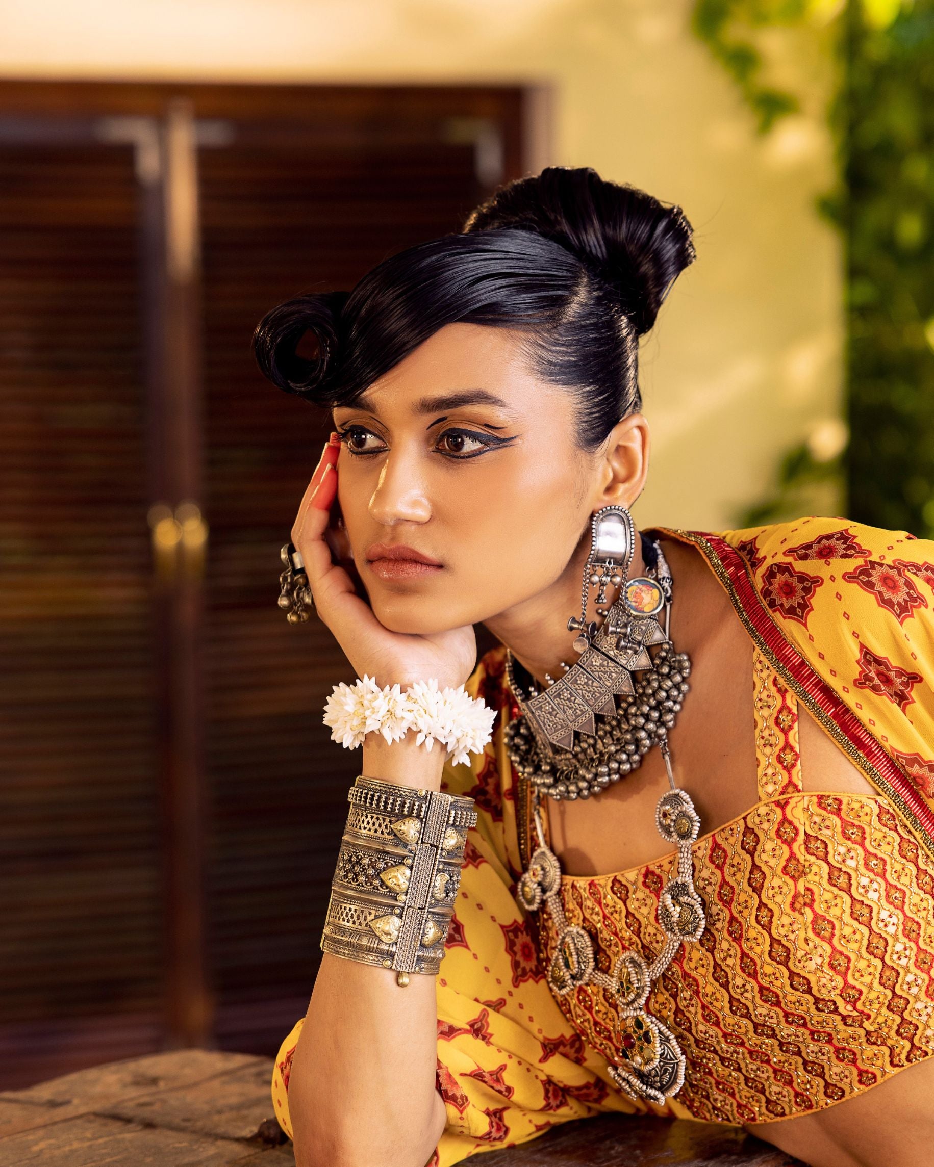 Yellow bustier in georgette with embroidery and print with  jacket and pants