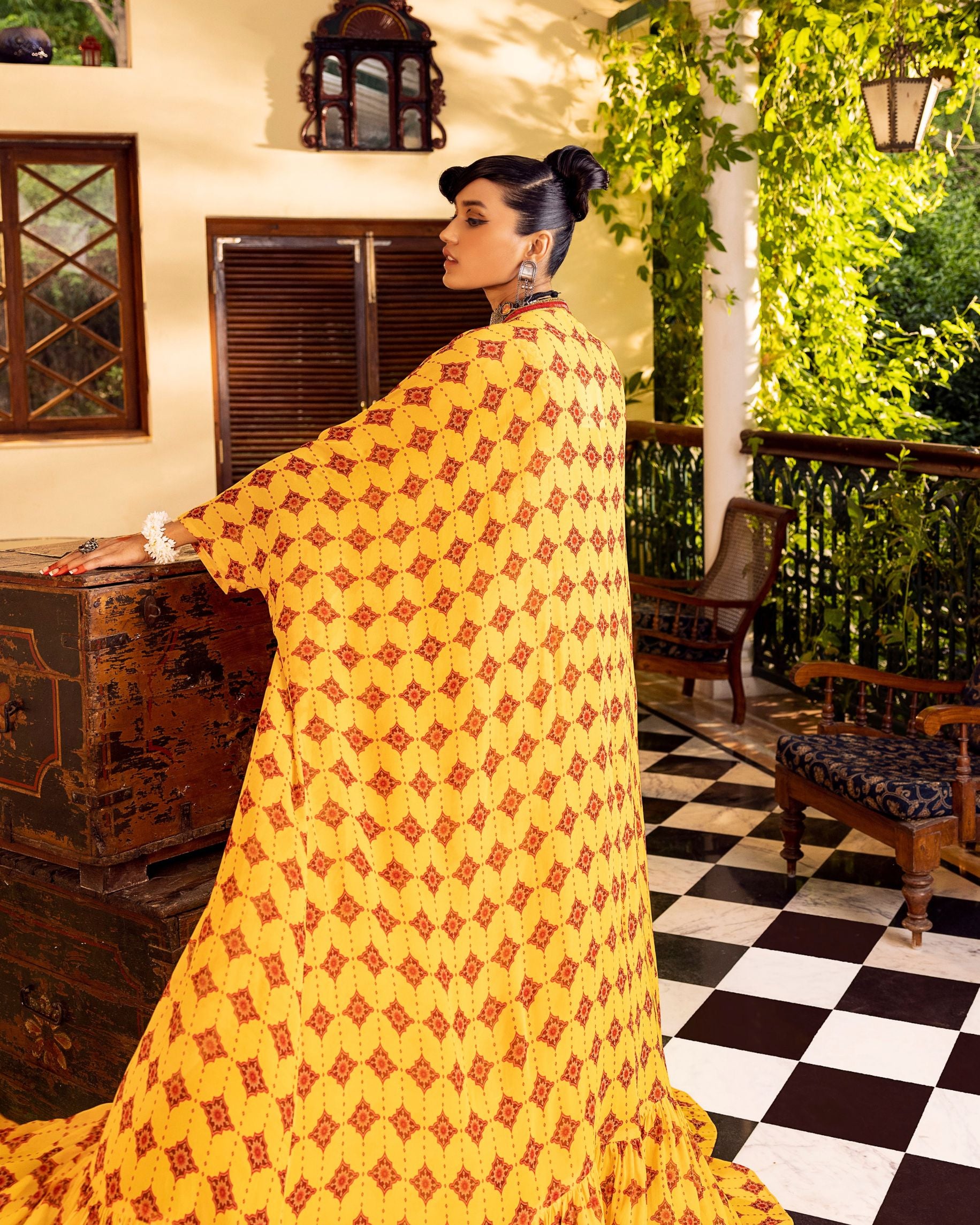 Yellow bustier in georgette with embroidery and print with  jacket and pants Backview