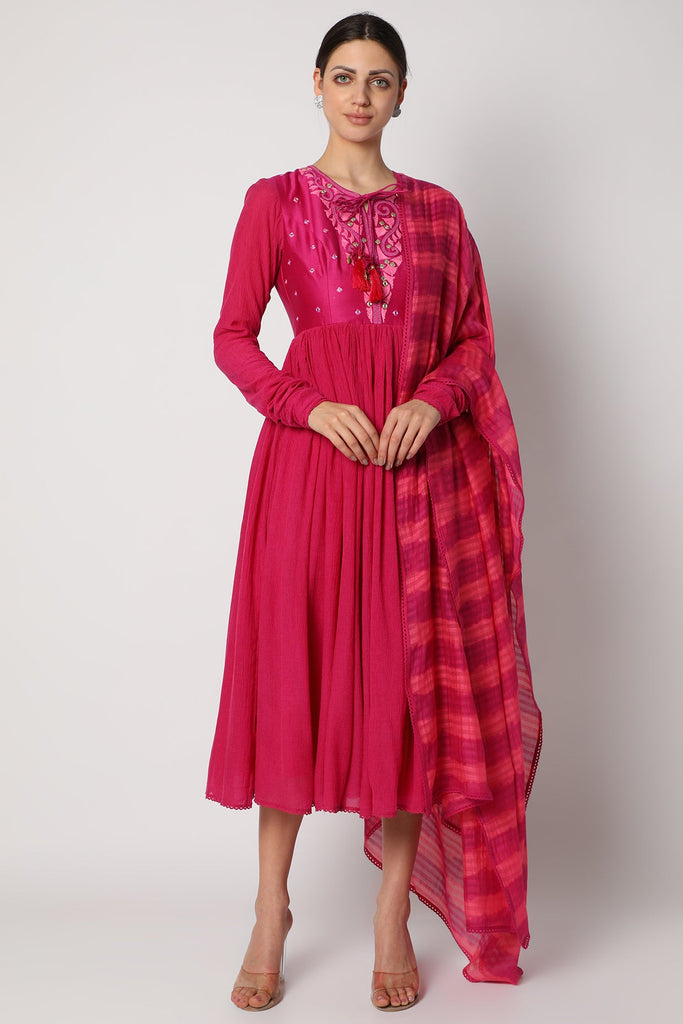 Magenta Anarkali Dress with embroidered yoke paired with a Tie-Dyed dupatta.