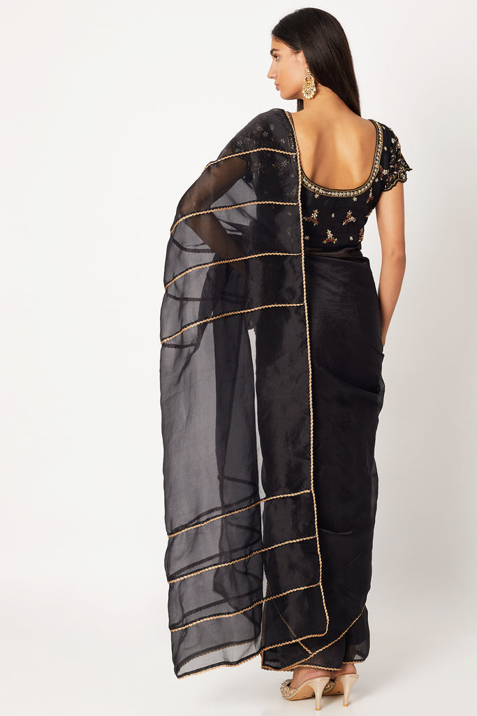Sheer Organza Saree with Planned Pleats and Embroidered Blouse Backview